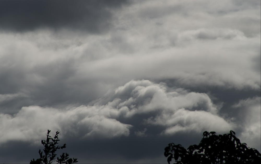 Rain and drizzle will clear eastwards early in the night