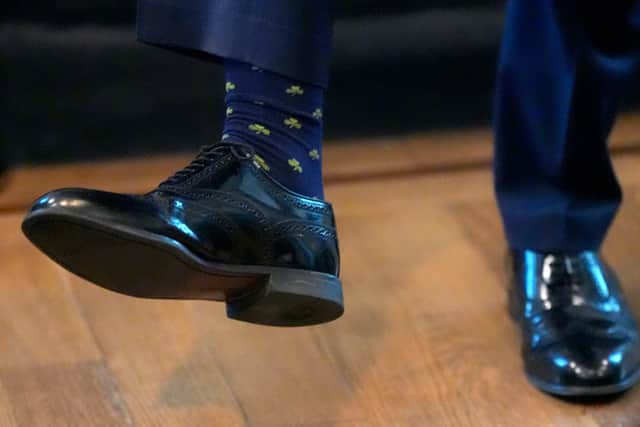 The vice president was wearing a pair of socks with shamrocks for St Patrick’s Day.