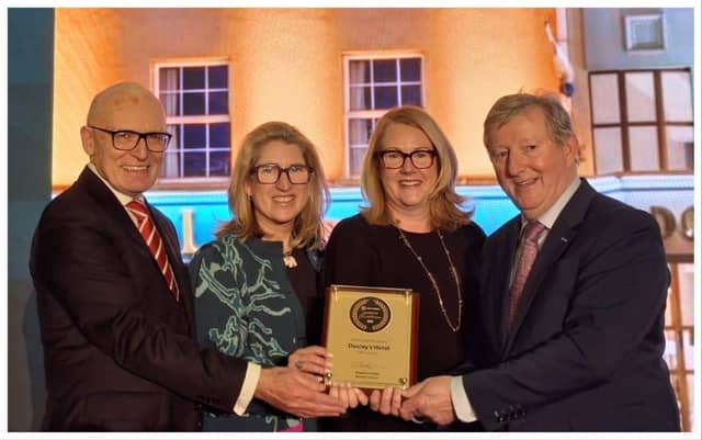 Aidan Murphy, Chair of CIE Tours, and Minister of State at the Department of Transport Sean Canney with sisters Mags and Tina Darrer, of Dooley’s Hotel