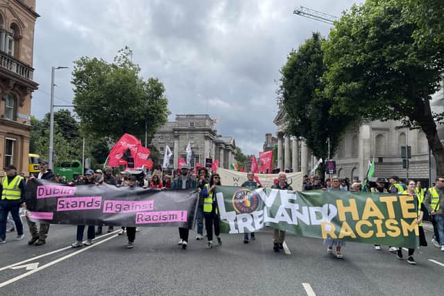 Several people were seen wearing “Make Ireland Great Again” green caps and holding US or “Trump” flags, and some signs critical of RTE.