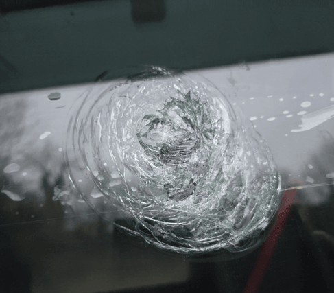 The windscreen of one of the damaged vehicles