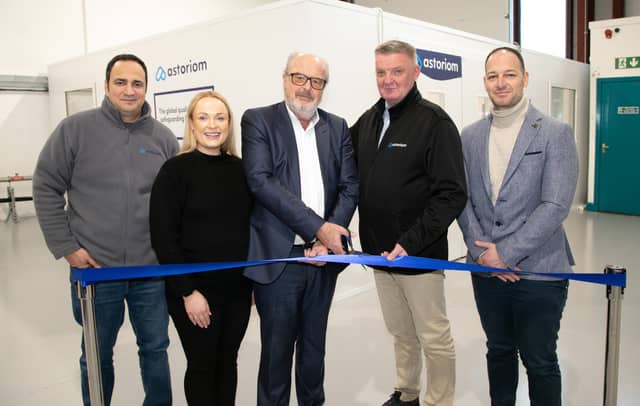 Gerald Hurley, CEO of Waterford Chamber of Commerce and Con Hurley, Astoriom Account Manager cutting a ribbon mark the official opening of the new suite | PICTURES: John P ower