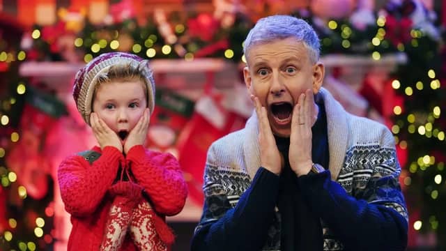 Patrick Kielty with Louis Hanna, from Dublin, at the unveiling of the theme and set for The Late Late Toy Show, at RTÉ studios in Dublin | PICTURES: Brian Lawless/PA