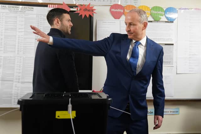 After voting in the suburbs of Cork city with his wife Mary, his daughter Aoibhe, and his sons Micheal Aodh and Cillian, the Fianna Fail leader and Tanaiste said his party had run a positive campaign in a “close-fought race” as he argued for the formation of a “coherent, stable” government.