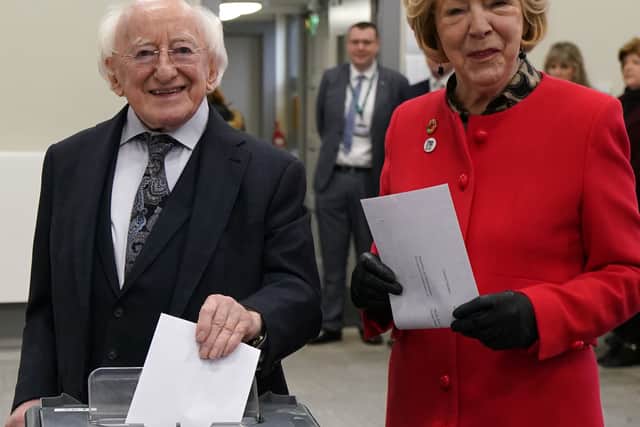 Irish president Michael D Higgins and his wife Sabina cast their votes at their local polling station in the Phoenix Park as the leaders of smaller parties also came out early to vote.
