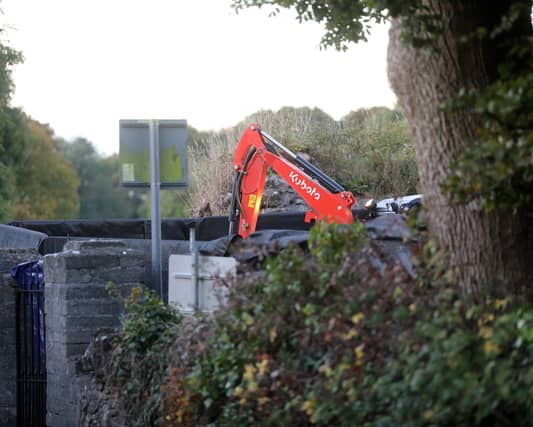 The remains of Patrick Nugent being exhumed at Feenagh cemetery in County Clare | PICTURE: Brendan Gleeson