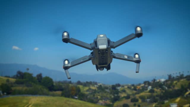 A dairy drone in action scanning farmland