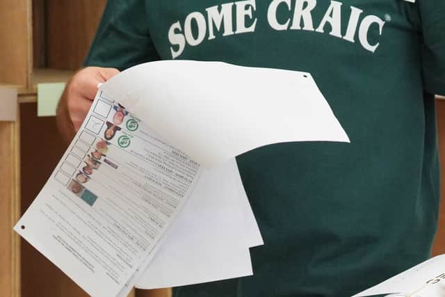 Count staffer Cian O’Connor, from Douglas Co Cork, wore a different novelty T-shirt for each day at the sport hall, getting a giggle from counters and lifting the mood of observers.