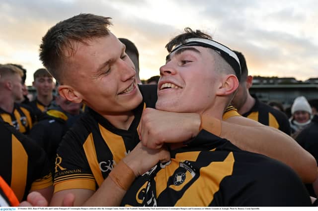 Rian O'Neill, left, and Caolan Finnegan of Crossmaglen Rangers celebrate after the Armagh County Senior Club Football Championship Final. Photo: Ramsey Cardy/Sportsfile