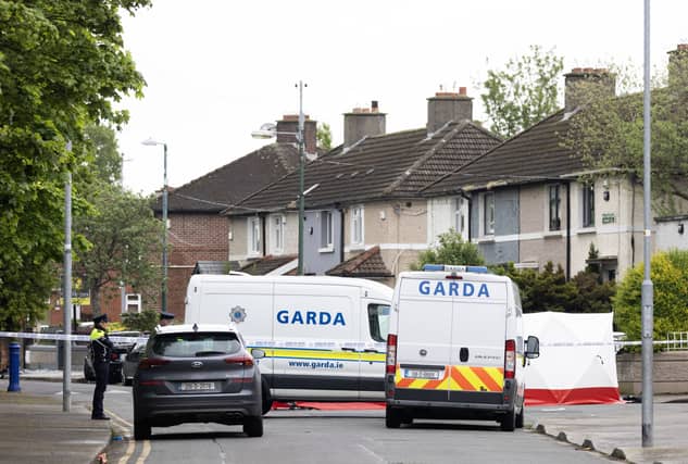 Gardai at the scene of the fatal shooting in Drimnagh, Dublin | PICTURE: PA