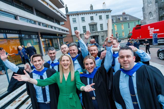 Graduate Recruit Prison Officers celebrating their graduation with Minister for Justice Helen McEntee