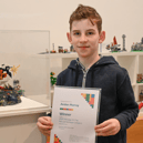 Aedan Murray with his LEGO® model of Turnstone