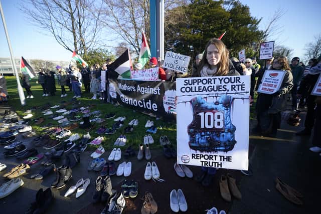 Protesters carrying Palestine flags and placards criticising the Israeli regime were among the large crowd that gathered outside the gates of the landmark building to hear a series of speeches.