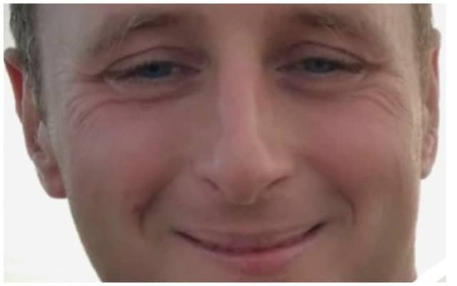John is described as being 5’ 10” in height, of medium build with short brown hair.