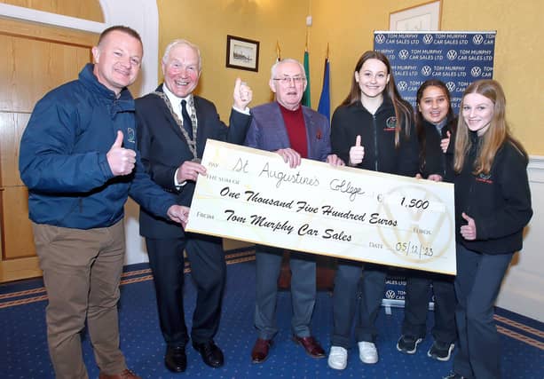 Mayor of Waterford City and County, Cllr. Joe Conway and Tom Murphy, Tom Murphy Car Sales, presenting cheque to the winning school