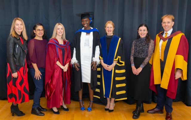 SETU Sanctuary Scholarship graduate Grace Finlari (centre) pictured with the President of SETU, Prof. Veronica Campbell (third from right) and members of SETU’s University of Sanctuary Working Group