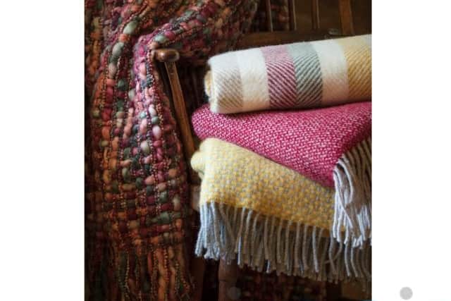 9. National Trust Wool Throw, Vintage Fishbone Stripe, £45 (€52) (top), Chunky Knit Recycled Rust Throw, £50 (€58) (draped on chair), rest of items from a selection, National Trust.