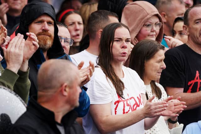 Many wore Aslan T-shirts and the crowds sang along to some of the band’s biggest hits including Crazy World and This Is as the funeral procession stopped in Farnham Drive.