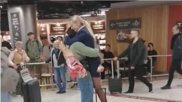 WATCH: Crowd watches on as man proposes to flight attendant in Dublin Airport
