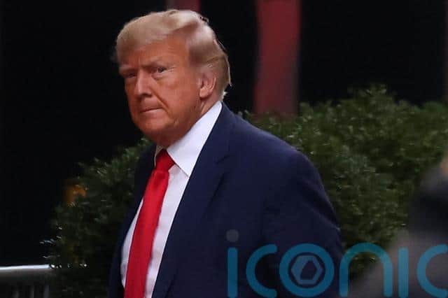 Mr Trump is scheduled to return to his Florida home, Mar-a-Lago, on Tuesday evening to hold a rally, punctuating his new reality, submitting to the dour demands of the American criminal justice system while projecting an aura of defiance and victimhood at celebratory campaign events.