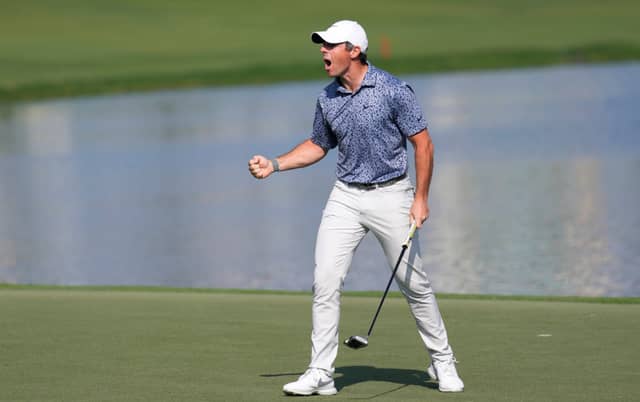 Rory McIlroy holds off rival Patrick Reed to win the Hero Dubai Desert Classic