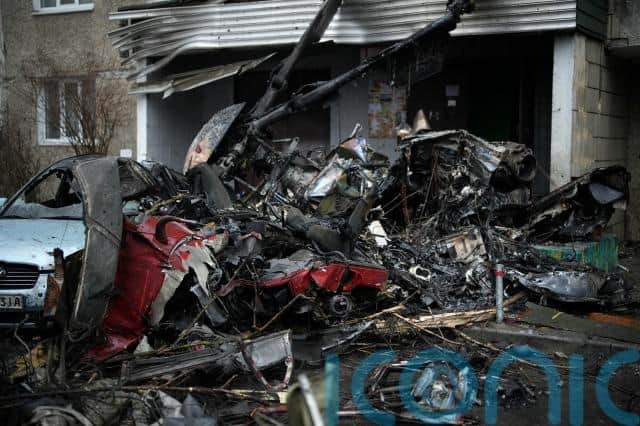Brovary resident Olga Prenzilevich told how she is “still in shock”, as she cleaned up the debris next to a cordoned-off mound of charred vehicles and misshapen wreckage where the helicopter fell.