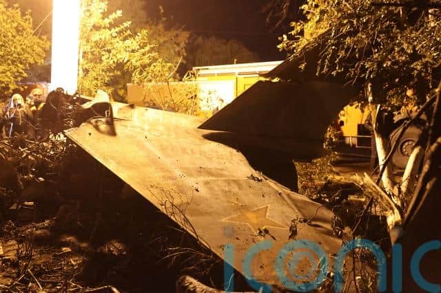 It said both crew members bailed out safely but the plane crashed into a residential area, causing a fire as tonnes of fuel exploded on impact.