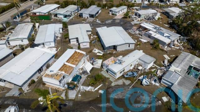 Four other storm-related deaths were reported in North Carolina and three in Cuba.