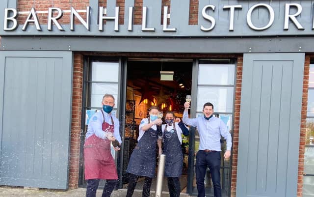 John Hoade, Andrea Carydias, Ruth Bowers and Mikey O’Brien celebrating at Barnhill Stores in Dalkey, Co. Dublin after selling the Match 5+Bonus ticket