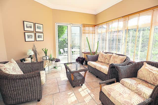 The residence’s accommodation consists of an entrance hall, kitchen/dining room, sitting room, sunroom, utility, WC, five beds, three baths, attic and double garage.