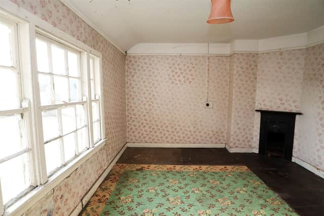 The layout at ground floor level comprises of an entrance hall, sitting room/bedroom, living room and kitchen, while the first floor level boasts two good sized double bedrooms.