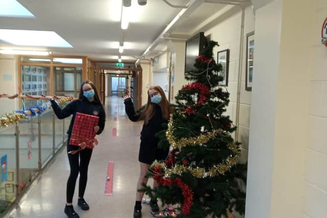 Santa will make a guest appearance at the concert with a sack full of presents for students.