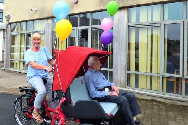 The ceremonial cutting of the ribbon to launch the use of the trishaw was performed by Dungarvan Community Hospital resident and Bonmahon native Paddy Mooney, who is in his 100th year.