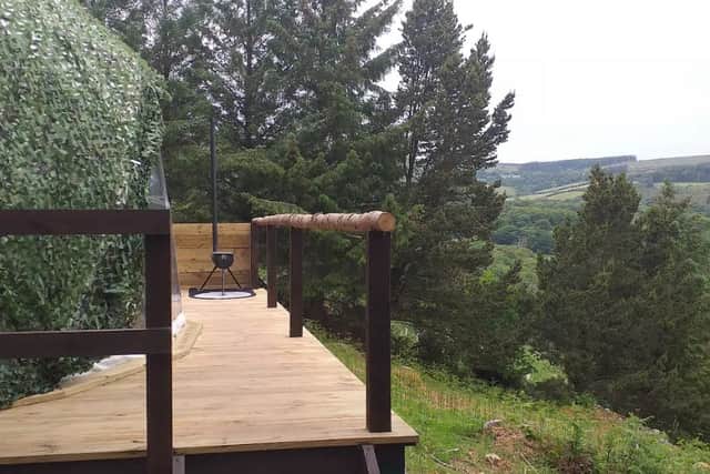 The dome is thoughtfully decorated to reflect and in-keep with its surroundings. Built into the hillside under some Scots Pines, using a mix of locally sourced materials and modern tweaks to compliment the natural setting.