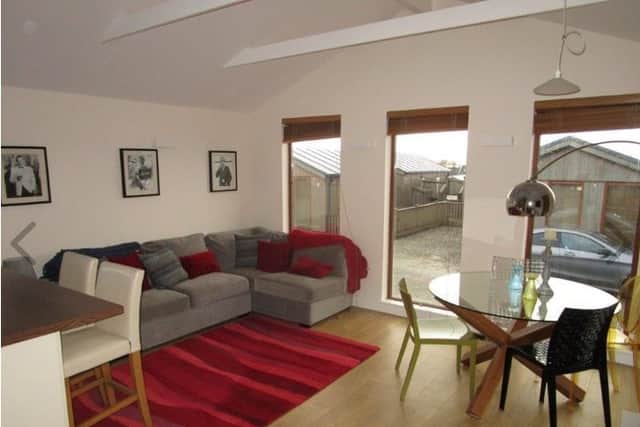 The interior is modern, stylish and comfortable with an open plan living/dining/kitchen area.