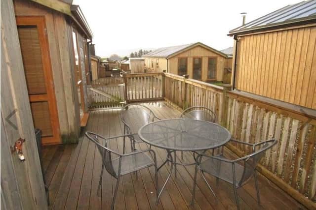 Comprised of three bedrooms, an en suite and main bathroom, there is even an attached decked patio area perfect for firing up the barbeque on a summer's evening, or simply sitting out with a novel in hand - all with side parking for 2 cars.