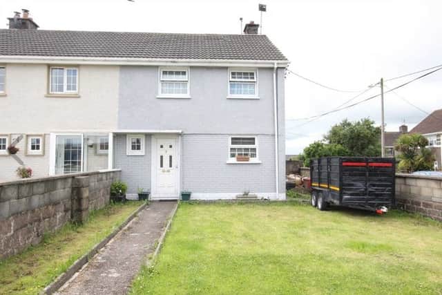 This three-bed end of terrace property in the waterfront town of Cobh, Co. Cork is going under the hammer later this month with a bargain guide price.