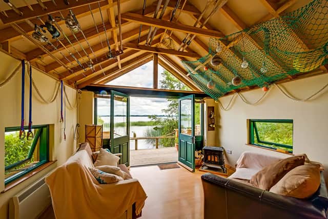 The boathouse, Pops Dream, is set overlooking Lough Derg in Co. Clare and is described by owner Barry as a "small slice of paradise on the sunny side of Lough Derg".