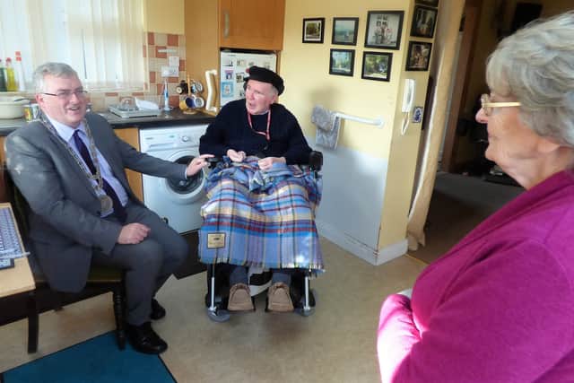 Mayor Pratt congratulated Pauline for her wonderful work as a carer, heard about her sterling career as a nurse, and joined herself and Joe in their home for a cupán tae and a chat.