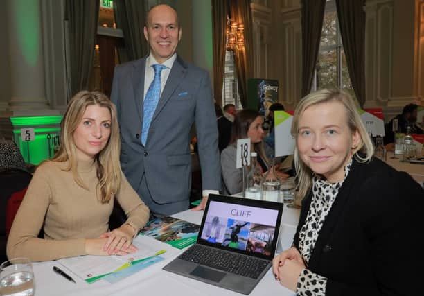 First Choice Conference and Events' Magdalen Smith, Tourism Ireland's Simon Gidman and Cliff House Hotel's Honor Byrne at the Ireland Meets the West End event in London