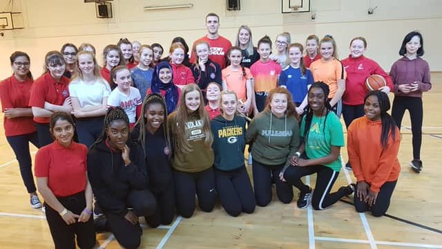 Basketball students with Wildcats' Maria Palarino and Vikings' Michael Grassey during Health and Wellbeing Week
