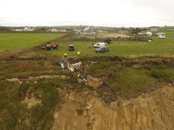 Specialists brought in to clear rubbish from Waterford cliff