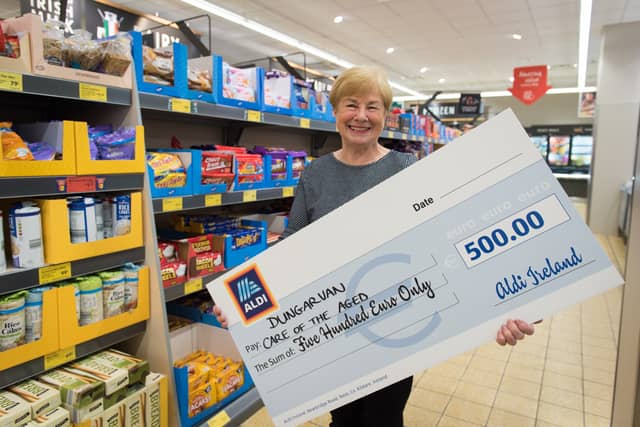 Dungarvan Aldi staff present cheque to local charity