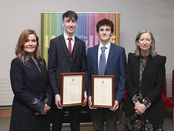 WIT President Scholarship students Leon Keating and Neil Quinn with Waterpark College's Judy Phelan and Frances Murphy. Photo: Photo George Goulding