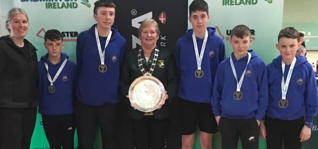 Proud coach Sheena Wilkinson and Betty Thompson from Badminton Ireland presenting the under 14 All-Ireland title to the boys of Blackwater Community School