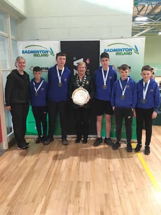 Proud coach Sheena Wilkinson and Betty Thompson from Badminton Ireland presenting the under 14 All-Ireland title to the boys of Blackwater Community School