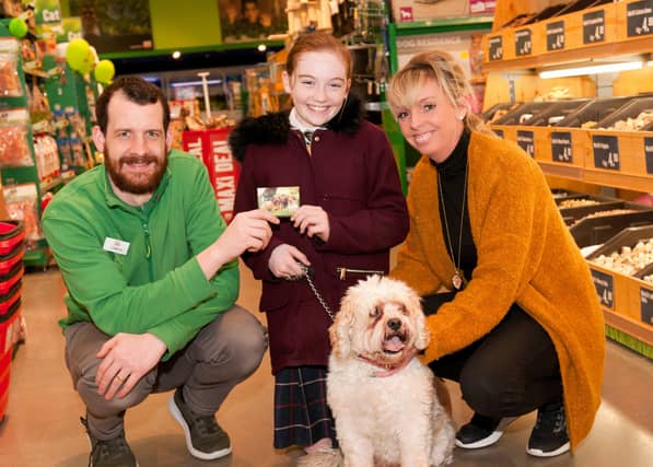 Bugsy with Michelle and Chole Barry and Maxi Zoo's Damian McKenna at Waterford Retail Park