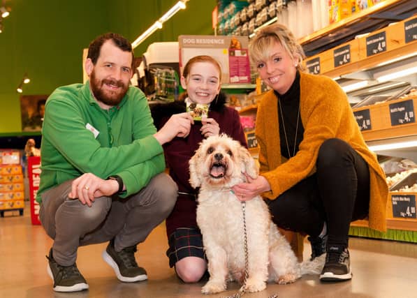 Adorable Waterford pooch picks up raffle prize