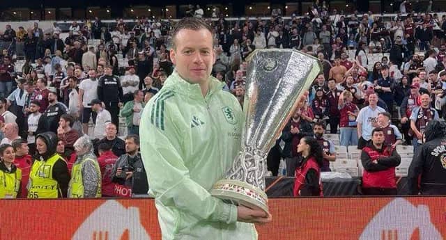 Paddy Moore pictured with the Europa League trophy after the game