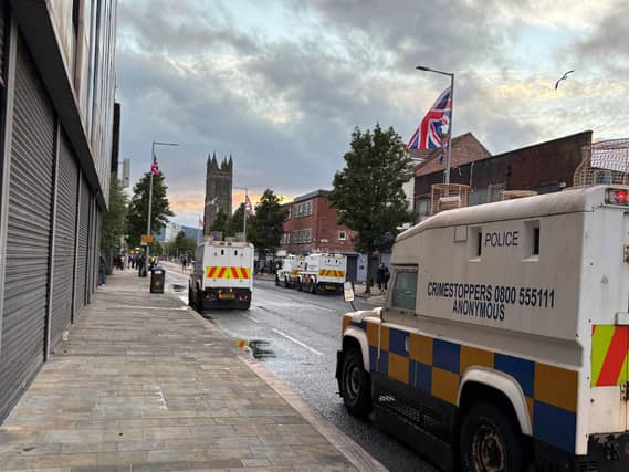 Police vehicles on the Newtownards Road in east Belfast